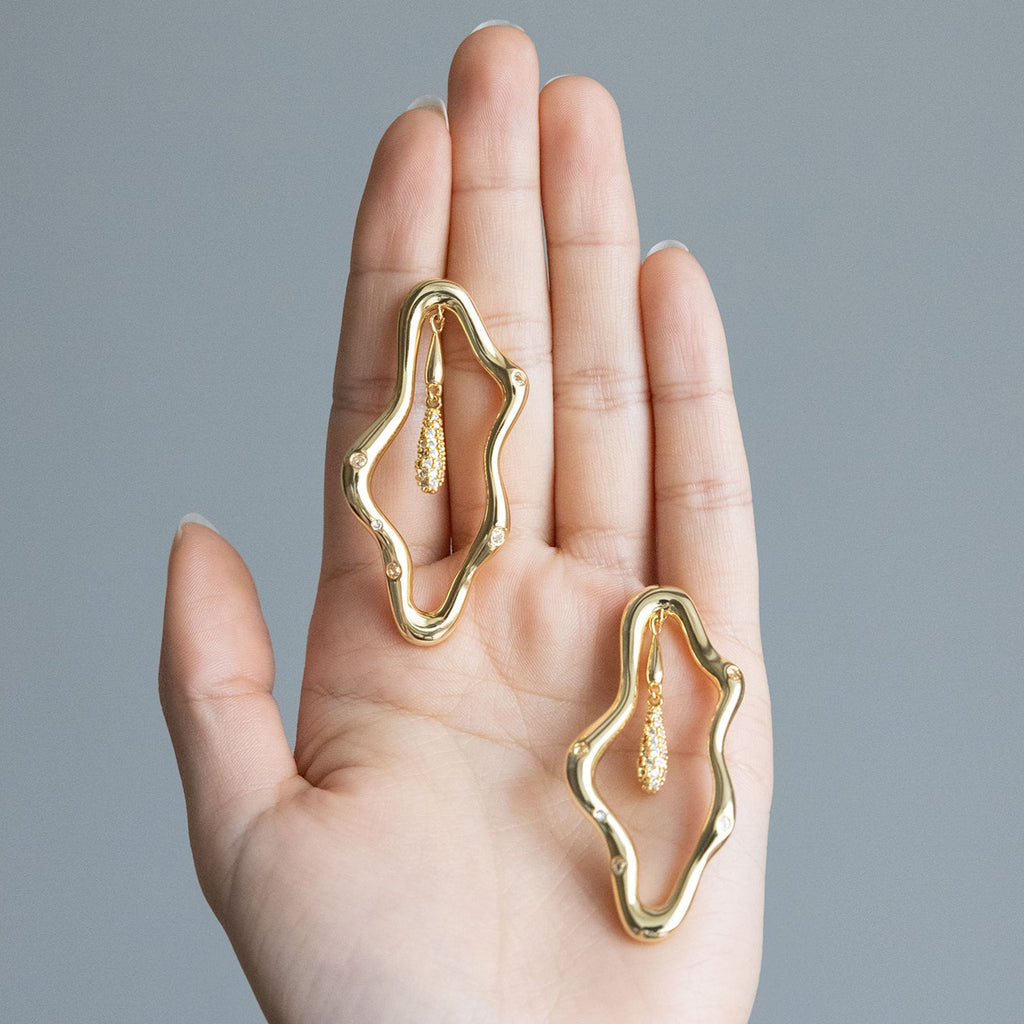 Zircon-encrusted sea wave wind chime earrings