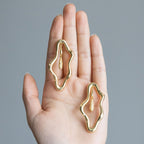 Zircon-encrusted sea wave wind chime earrings