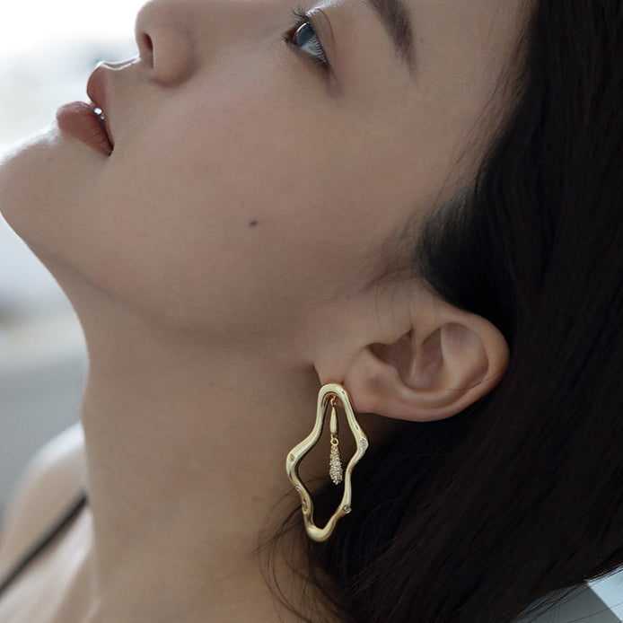 Zircon-encrusted sea wave wind chime earrings