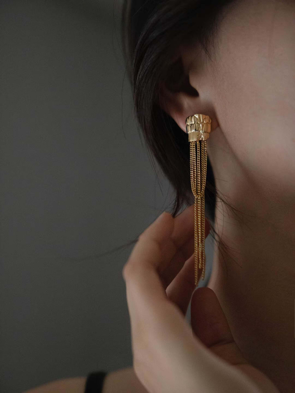 Asymmetric temple column tassel earrings