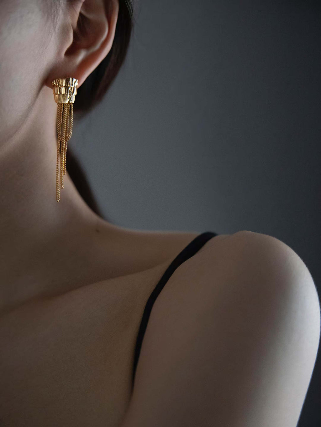 Asymmetric temple column tassel earrings