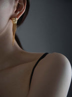Asymmetric temple column tassel earrings