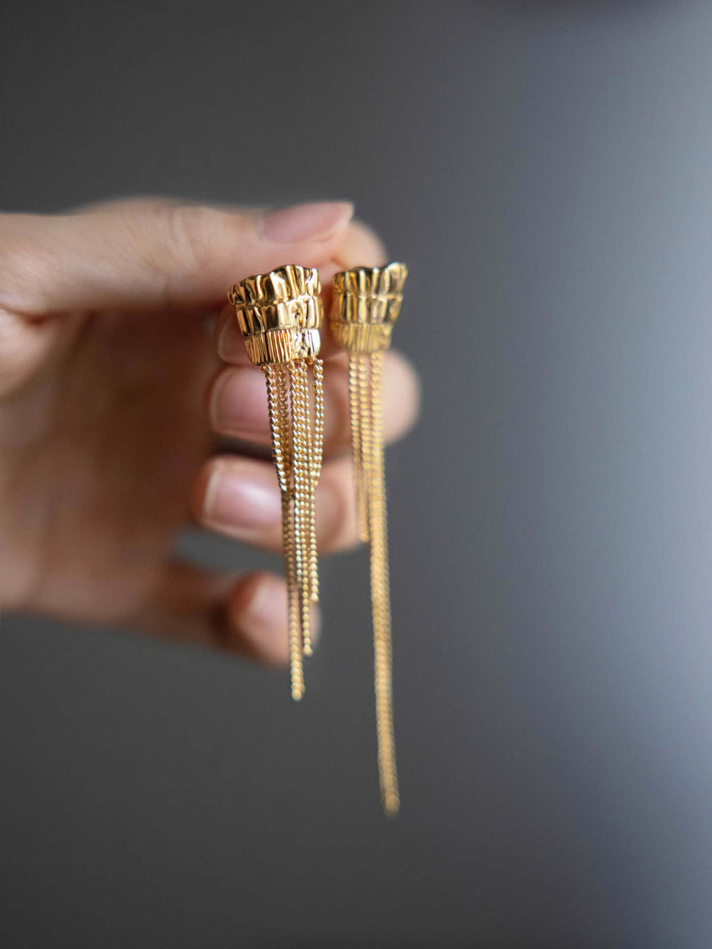 Asymmetric temple column tassel earrings