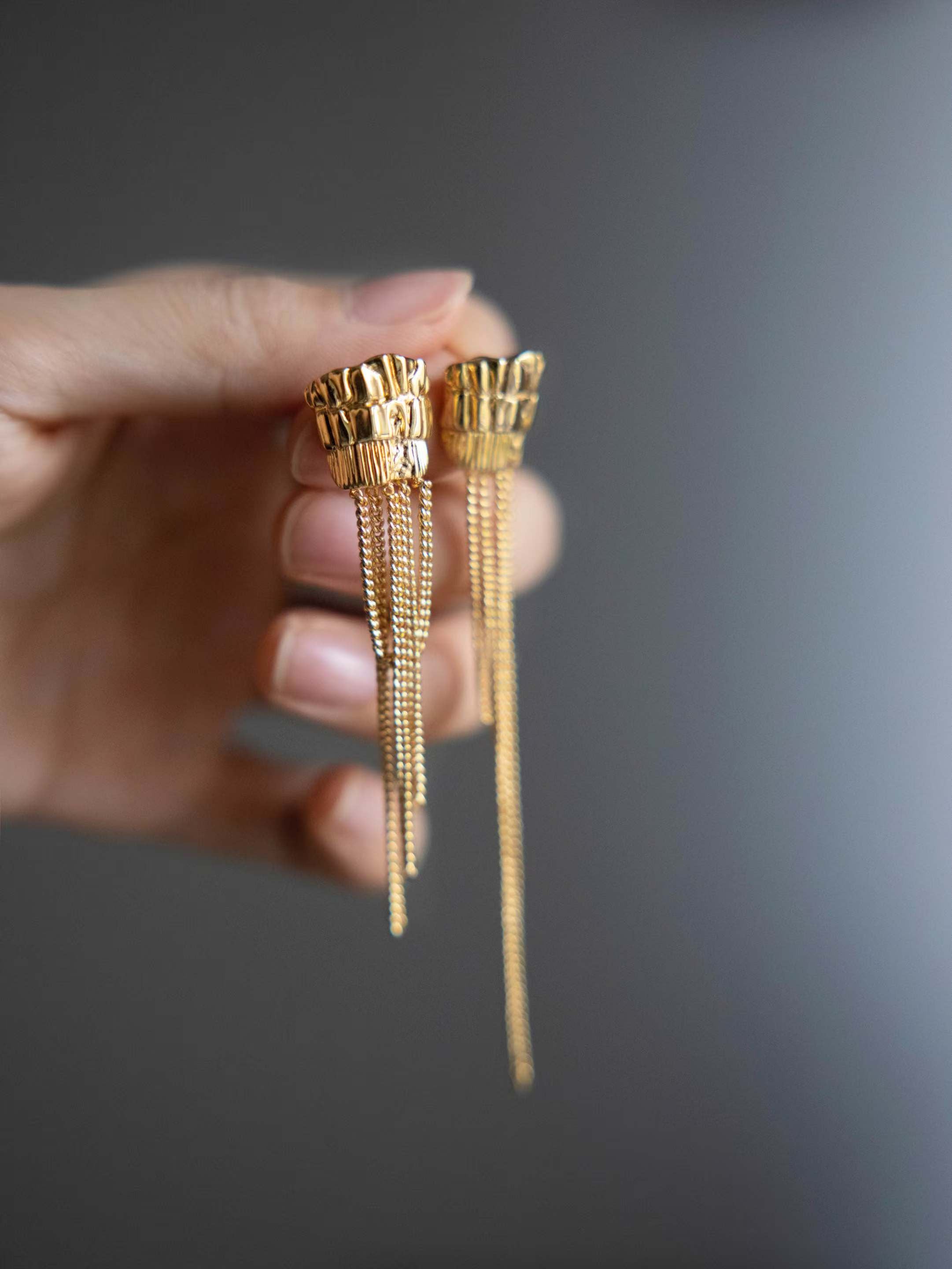 Asymmetric temple column tassel earrings
