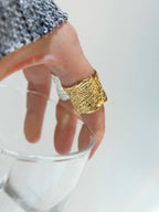 Volcanic rock texture with wide openings, bright golden